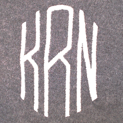 BLOOPER CLOTHING: Monogrammed Asymmetrical Turtleneck Tunic
