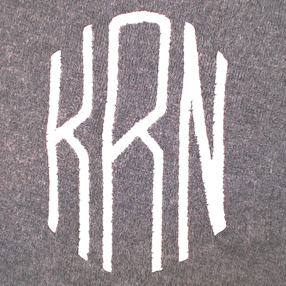 BLOOPER CLOTHING: Monogrammed Asymmetrical Turtleneck Tunic