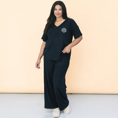 girl wearing personalized black pajamas