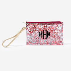 monogrammed glitter wristlet pouch in crimson with black octagonal monogram