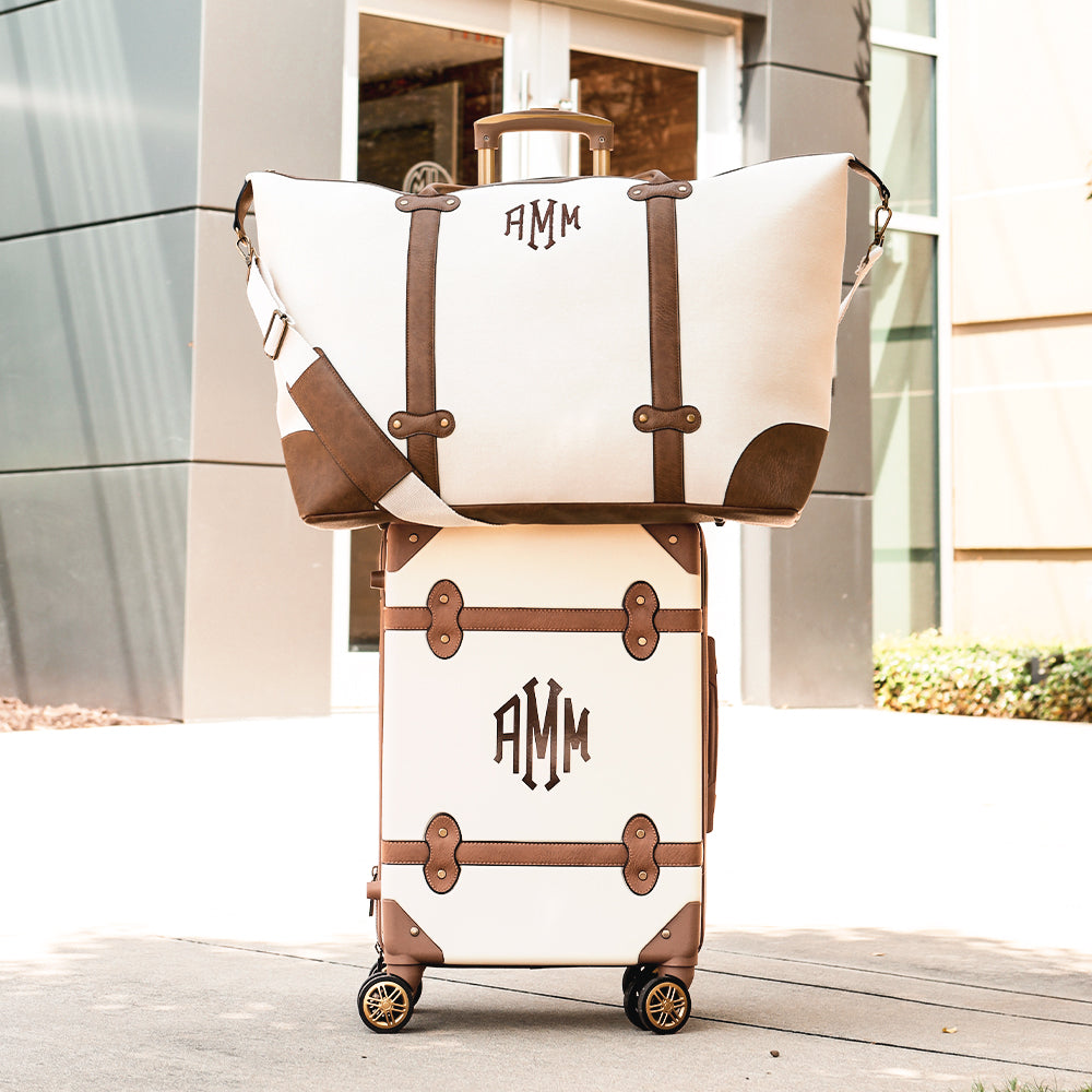 ivory vintage weekender on top of vintage suitcase - 2024