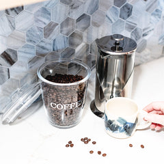 clear container with coffee