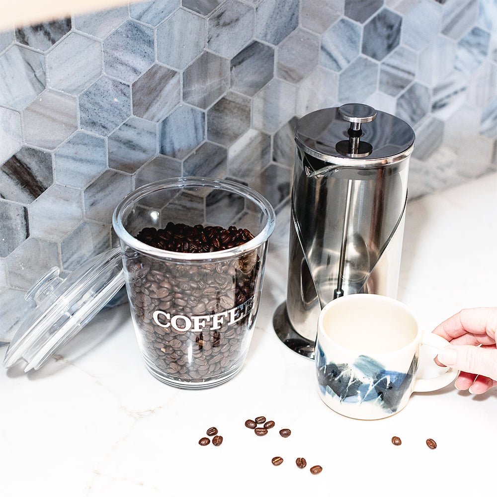 clear container with coffee