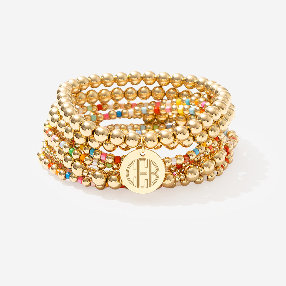 Monogrammed colorful bracelet stack