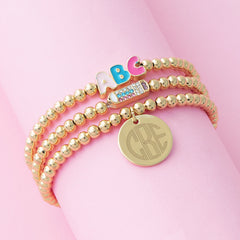 Gold monogrammed beaded teacher bracelets stack on pink new