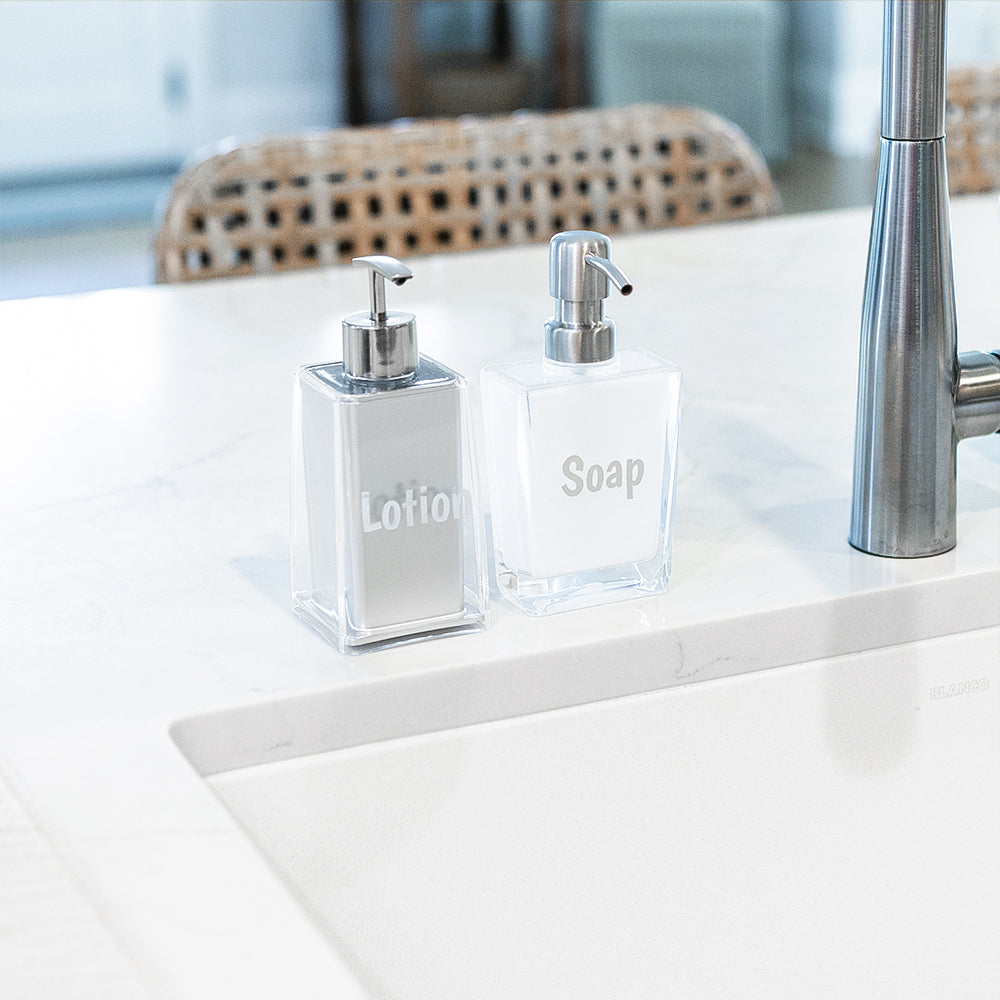 soap dispenser and lotion bottle on kitchen counter