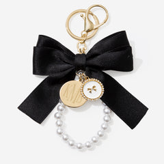 monogrammed bag charm keychain in black