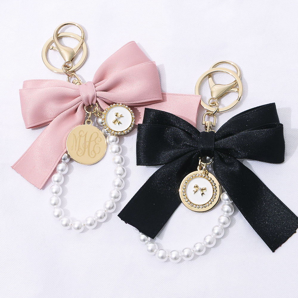 pink and black personalized bag charm keychains