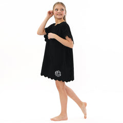 side of black bathing suit cover up