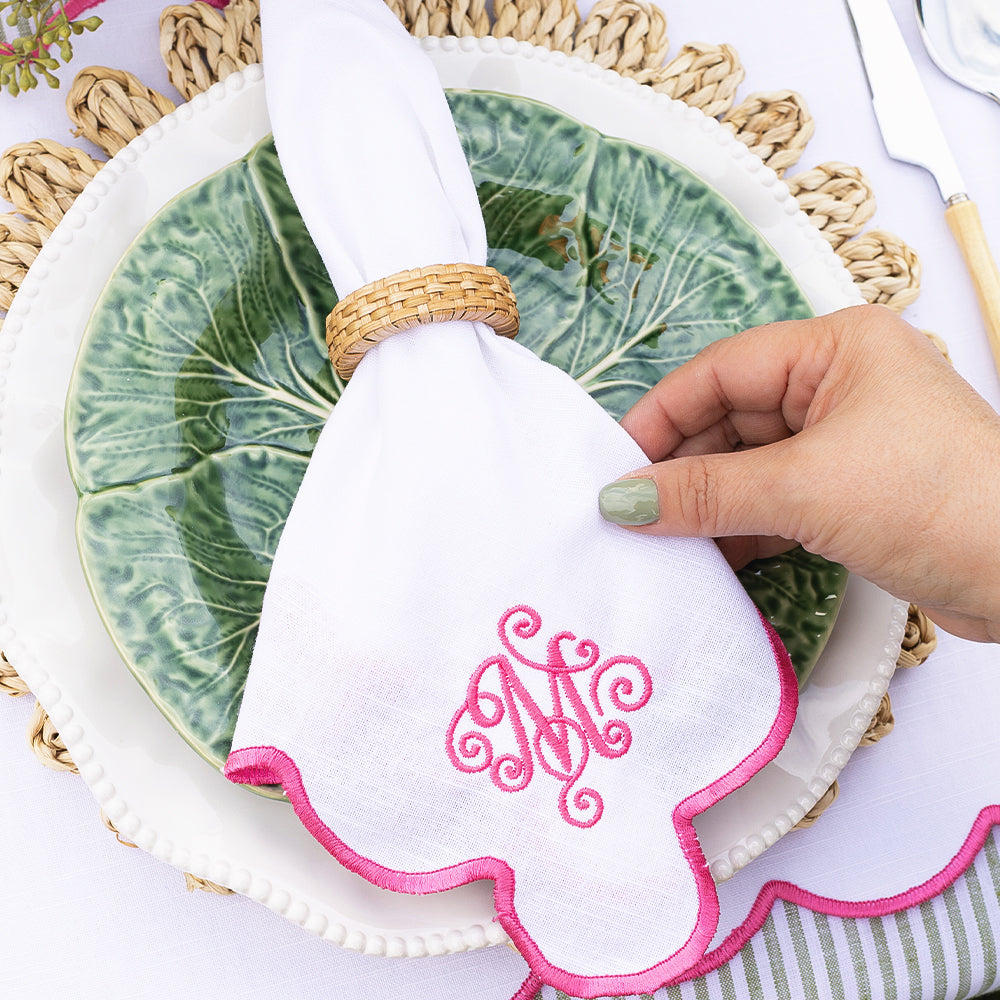 pink scalloped napkin table setting
