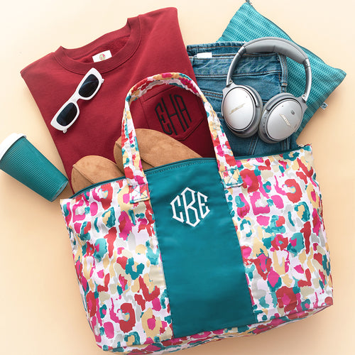 autumn watercolor cheetah packable weekend duffel bag flatlay