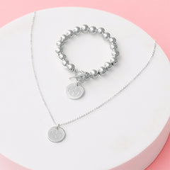 silver kids disc necklace with ball bracelet