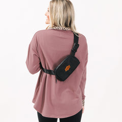oklahoma state black belt bag on back
