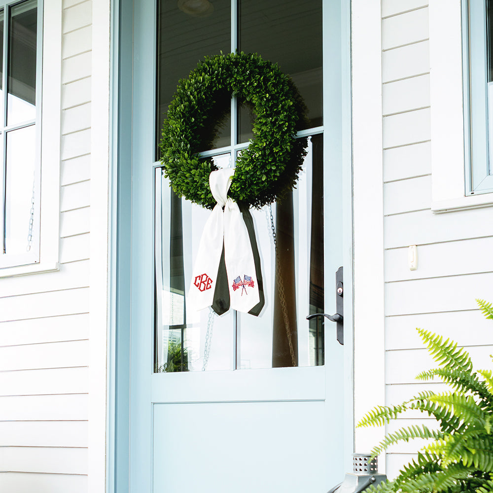 america wreath sash on blue door