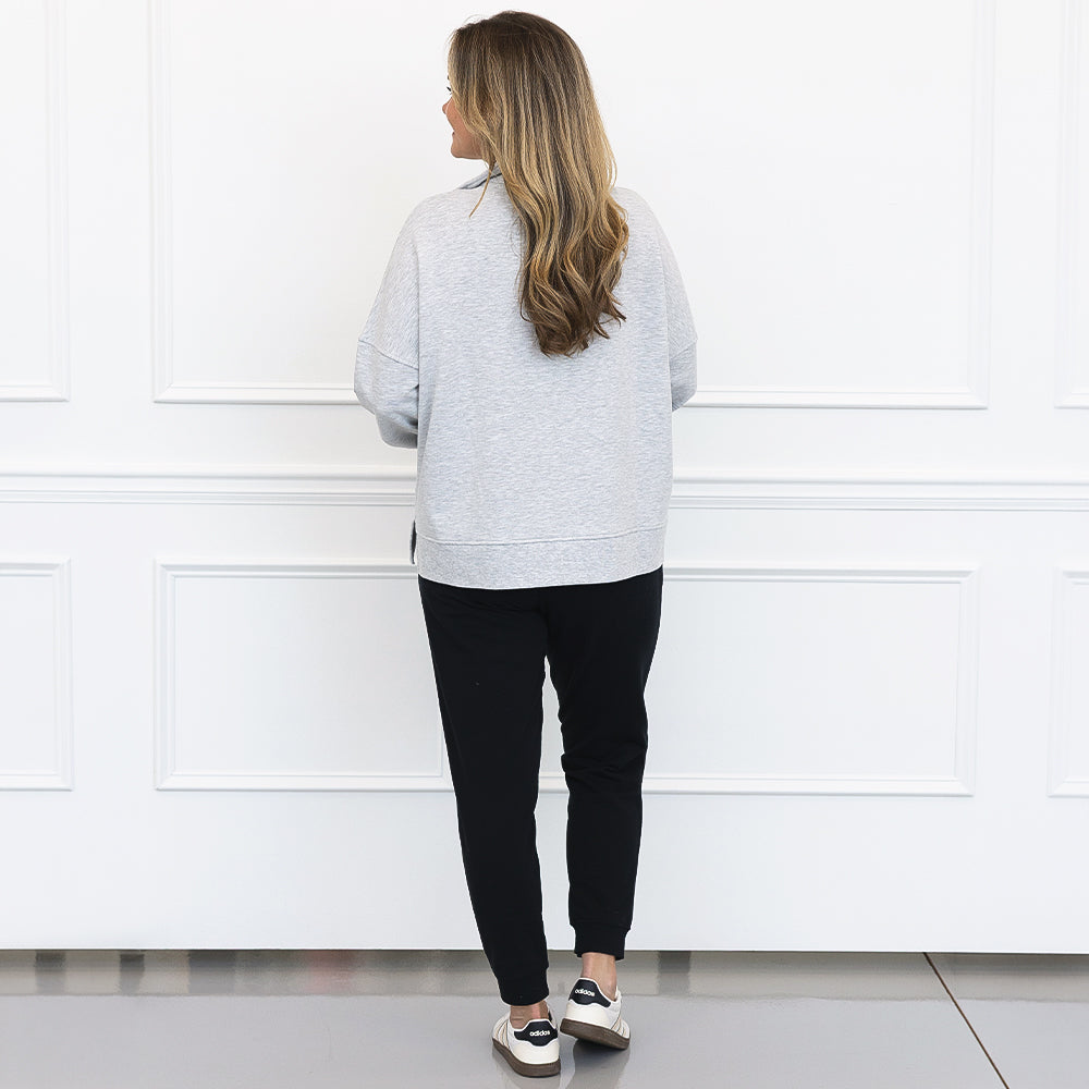 back of grey heather oversized quarter zip pullover