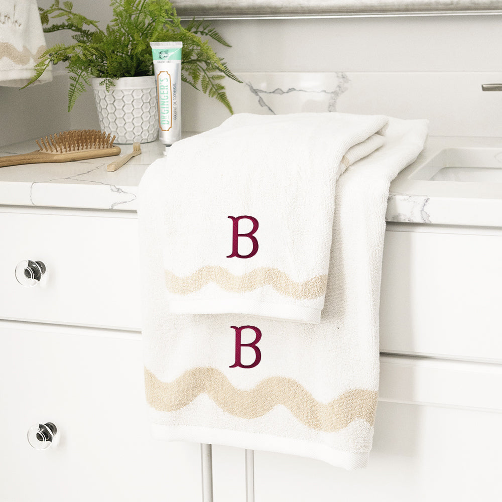 bath towel set with burgundy fishtail initial