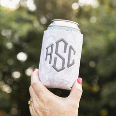 birch camo can koolie in hand