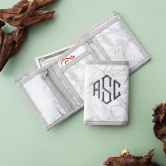 birch camo kids wallet flatlay on green