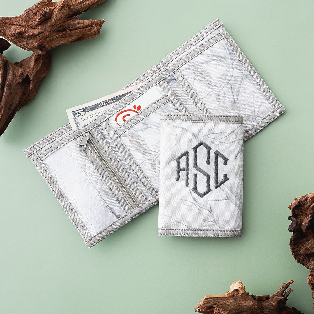 birch camo kids wallet flatlay on green
