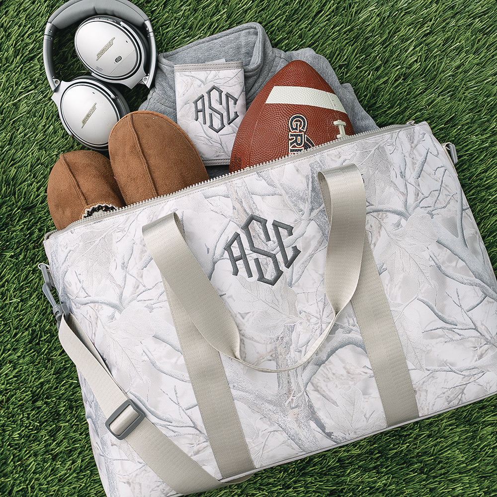 birch camo monogrammed kids weekend bag on turf