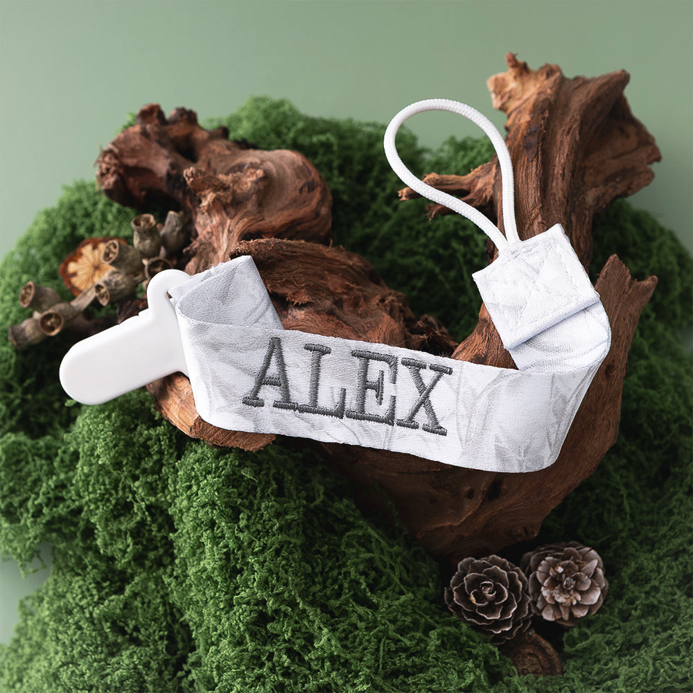 birch camo paci clip on moss and driftwood