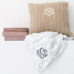 birch camo plush blanket with books and pillow
