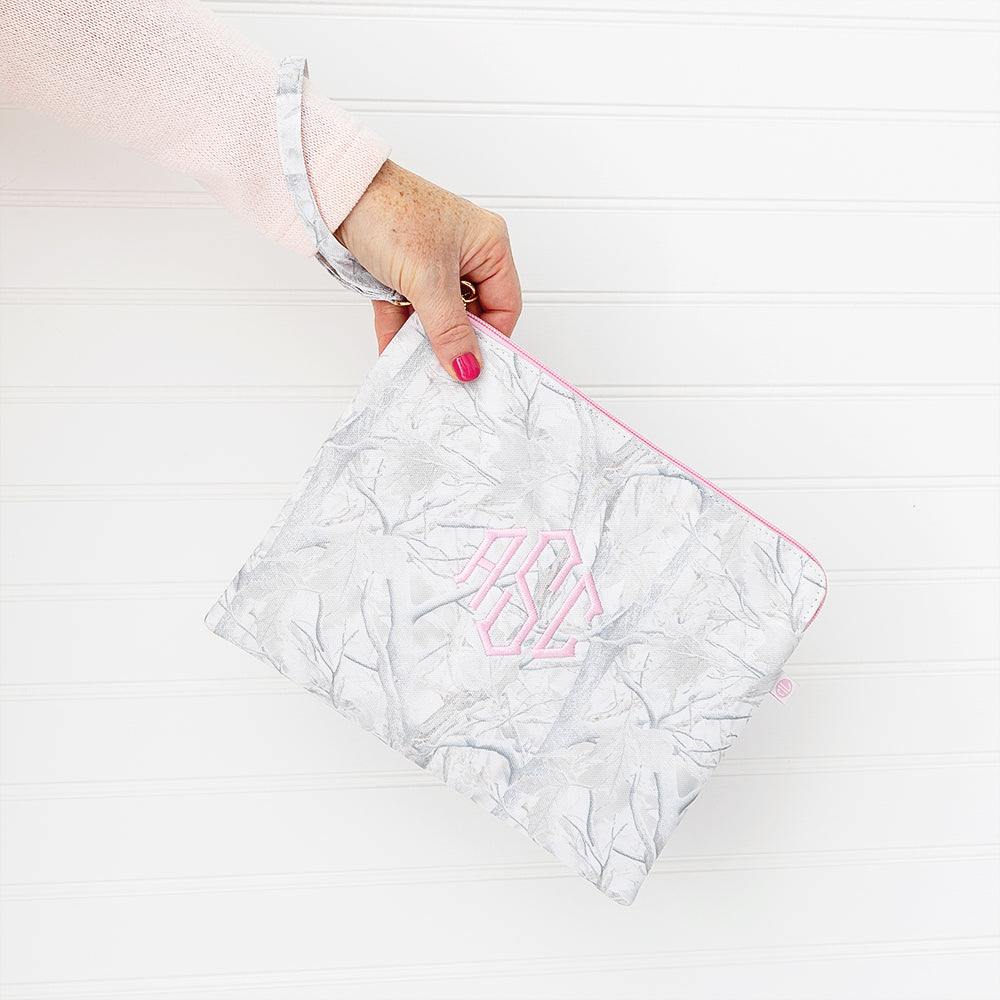 birch camo wristlet pouch on wrist