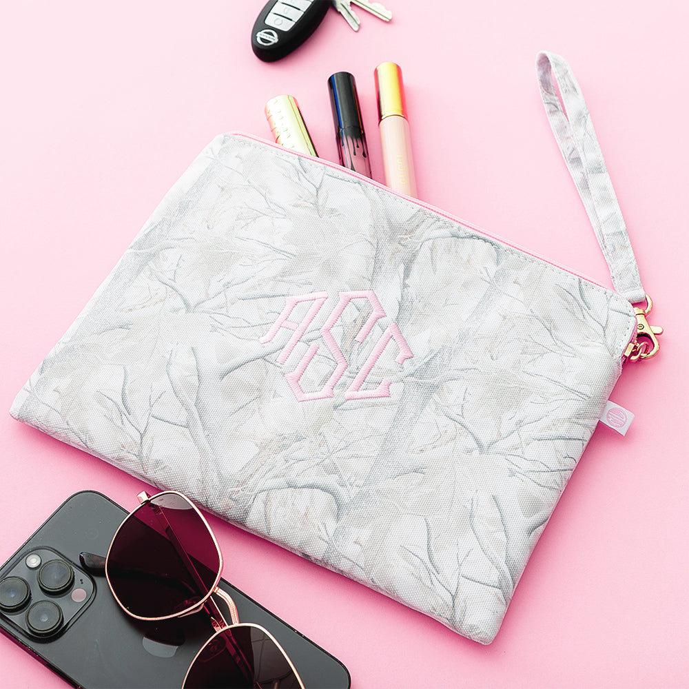 birch camo wristlet pouch spillshot flatlay