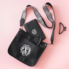 black and white monogrammed saddlebag with wallet