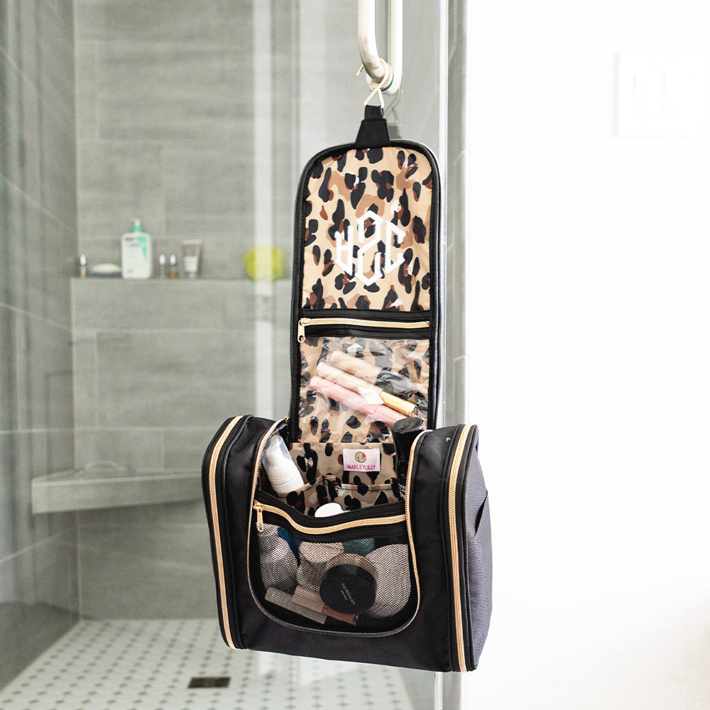 black classic cheetah hanging toiletry bag hanging up