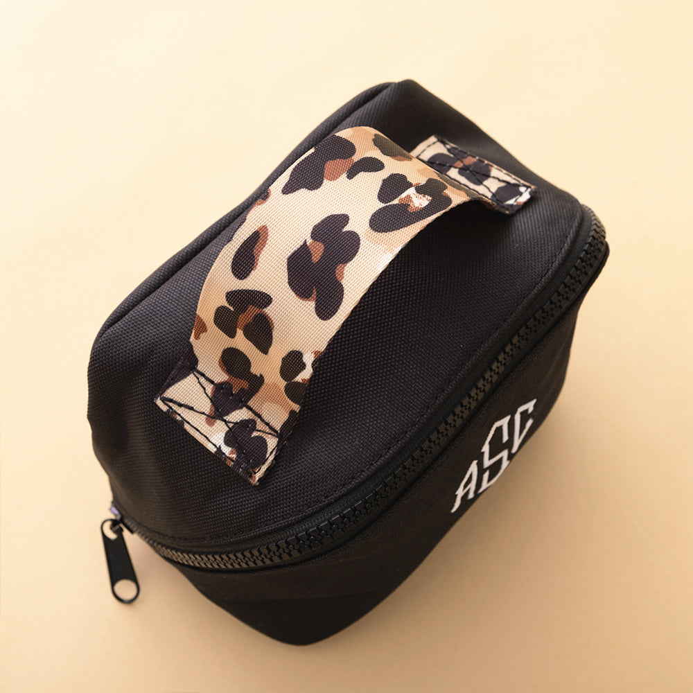 black classic cheetah makeup bag studio shot