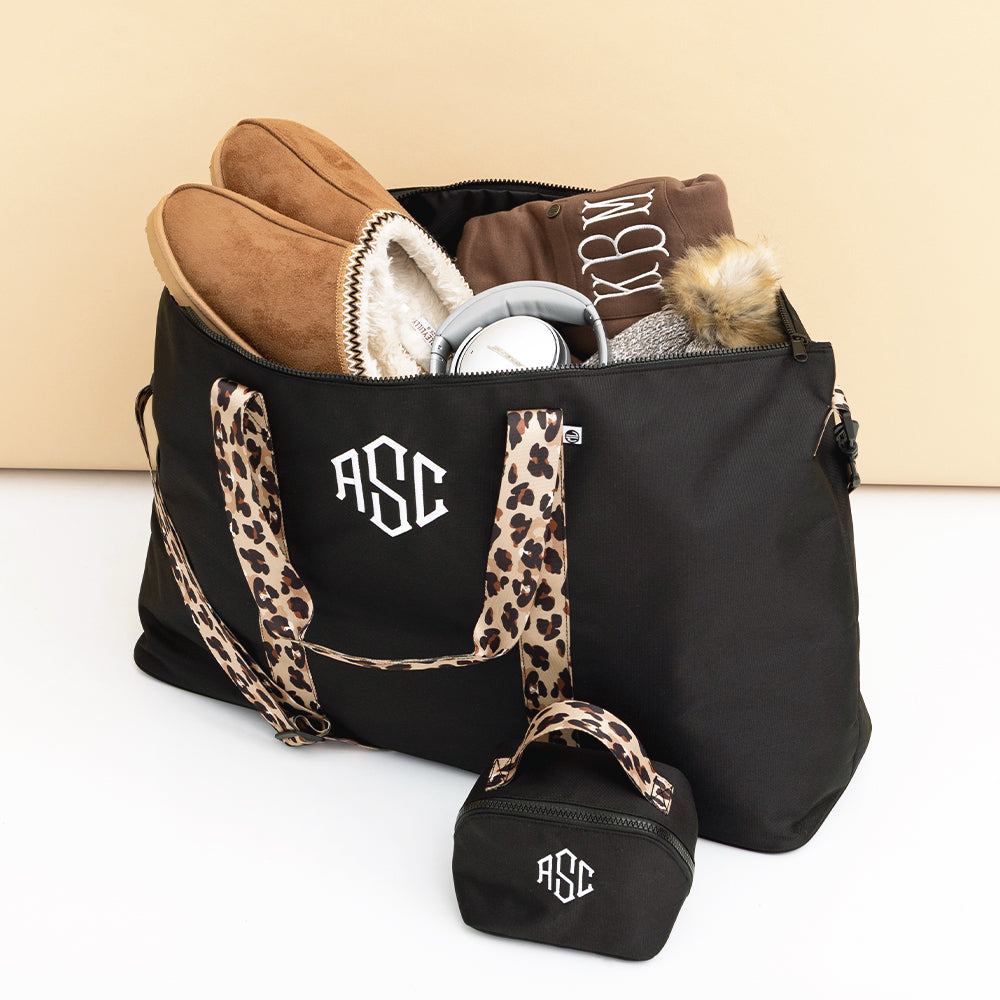 black classic cheetah makeup bag with weekend bag