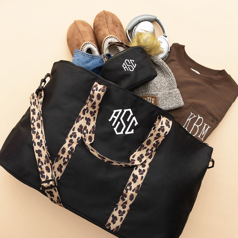 black classic cheetah makeup bag with weekend bag