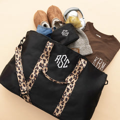 black classic cheetah makeup bag with weekend bag