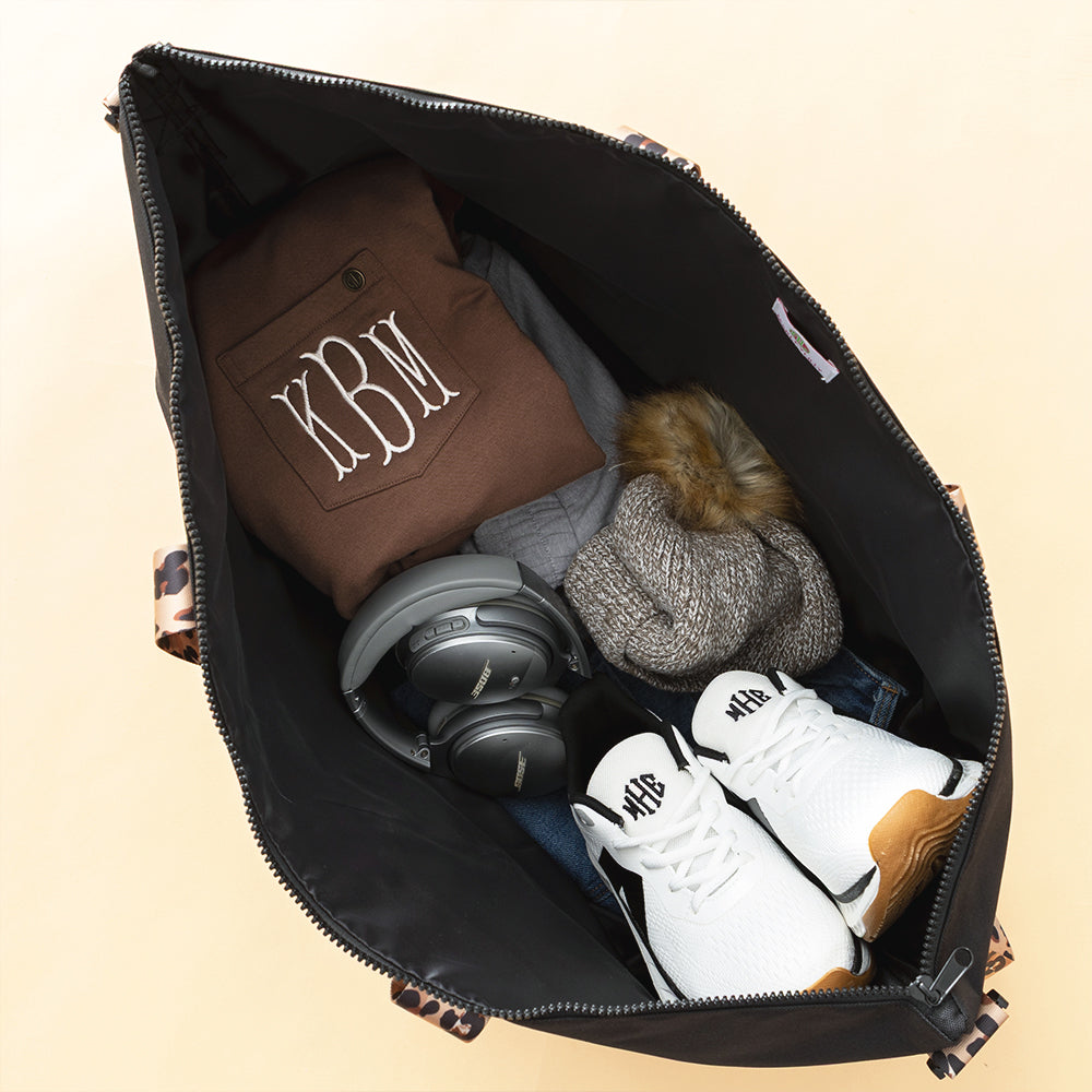 black classic cheetah weekend bag inside shot