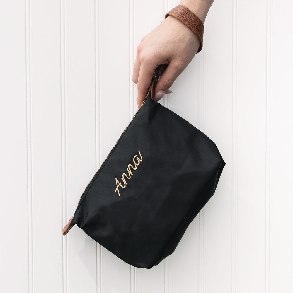 black monogrammed lightweight wristlet 