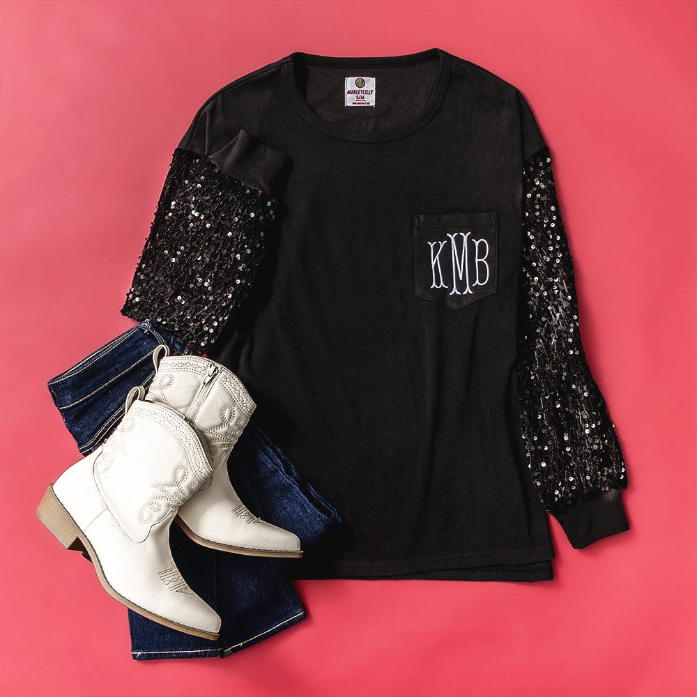 black monogrammed sequin sleeve sweatshirt flatlay