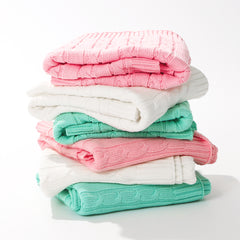 stacked personalized baby blankets