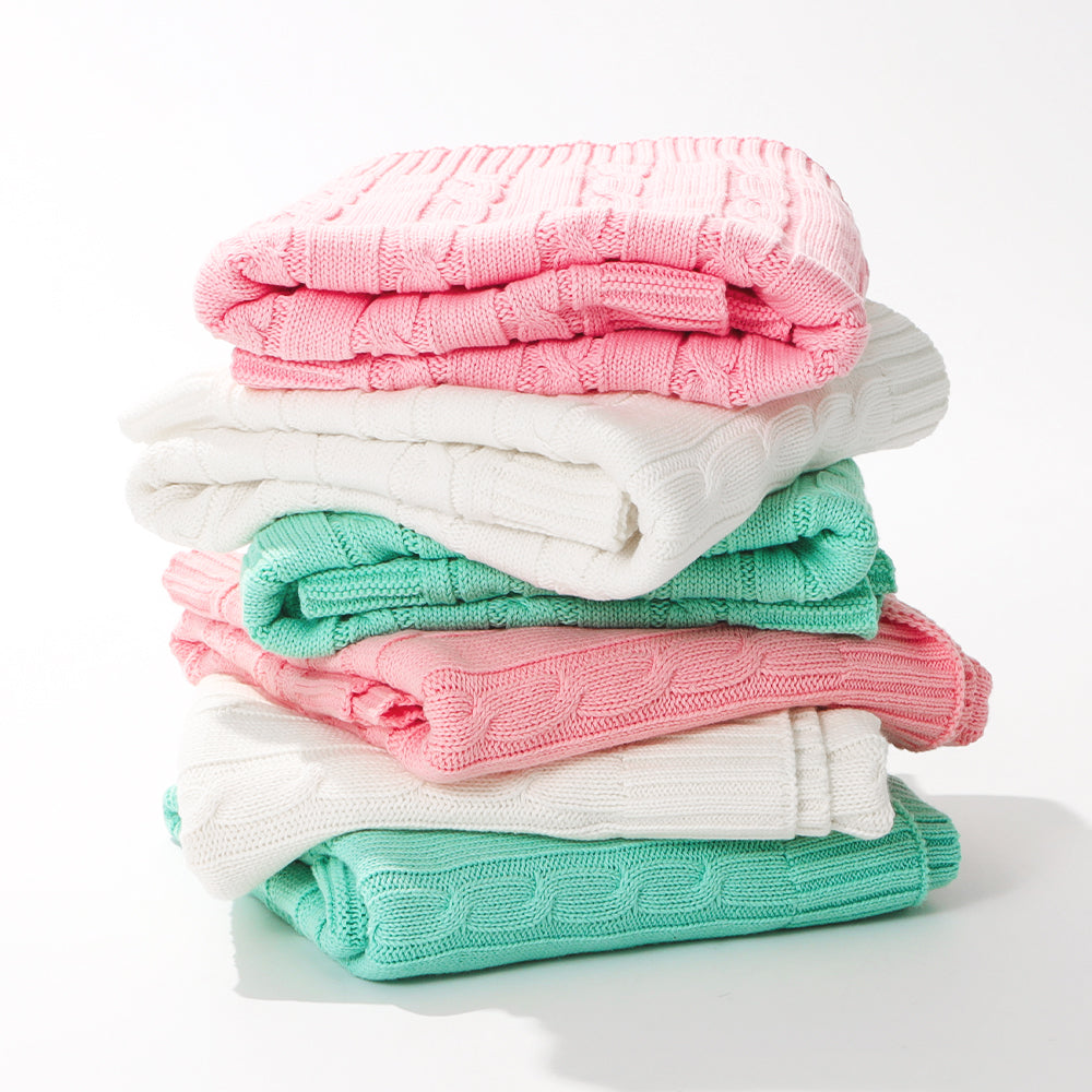 stacked personalized baby blankets