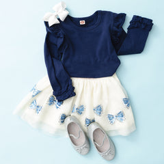 blue bows tutu skirt flatlay