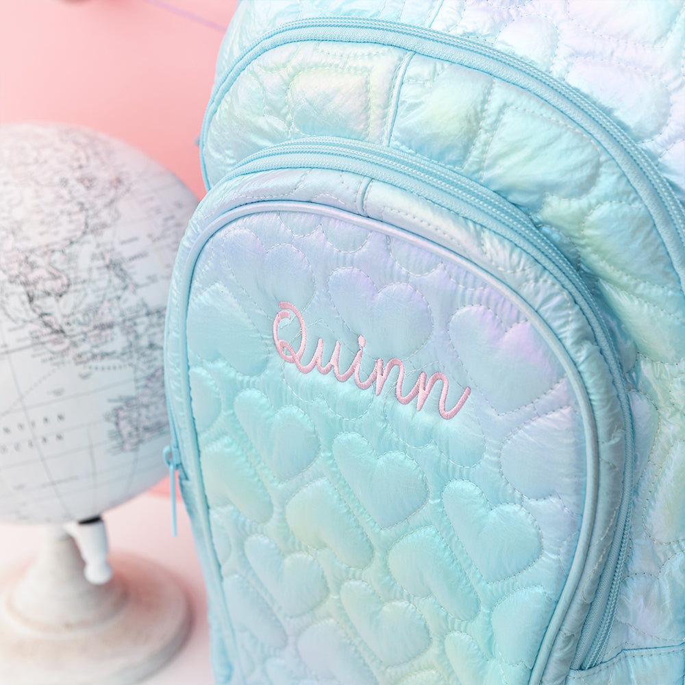 blue quilted hearts backpack detail shot monogram