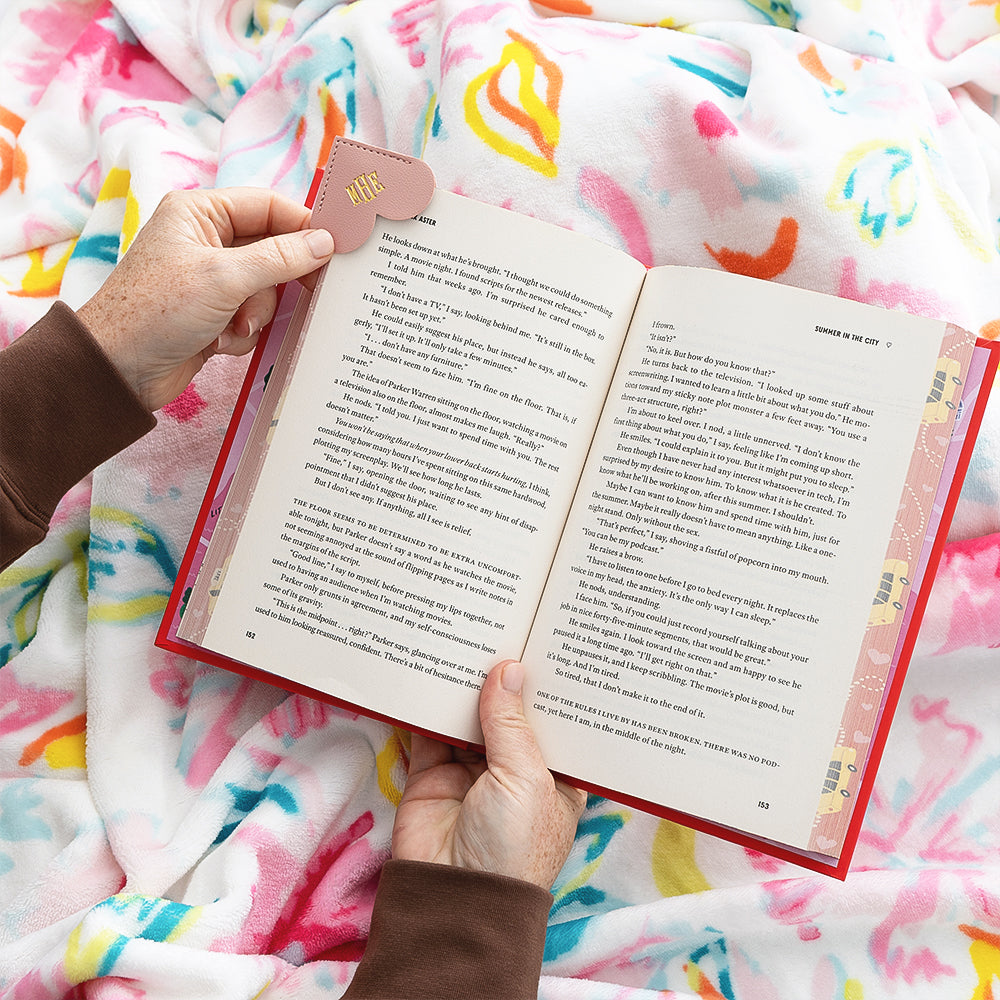 blush corner bookmark while girl reads book