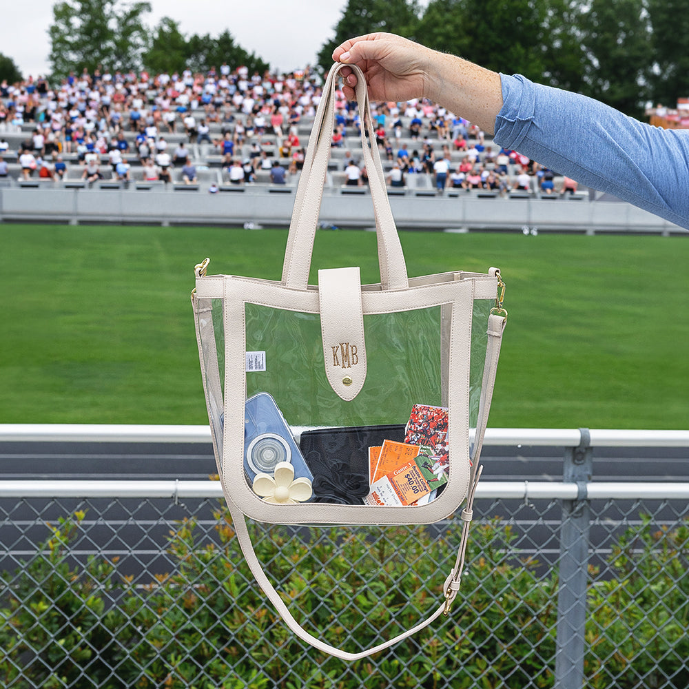 bone clear stadium tote held at game