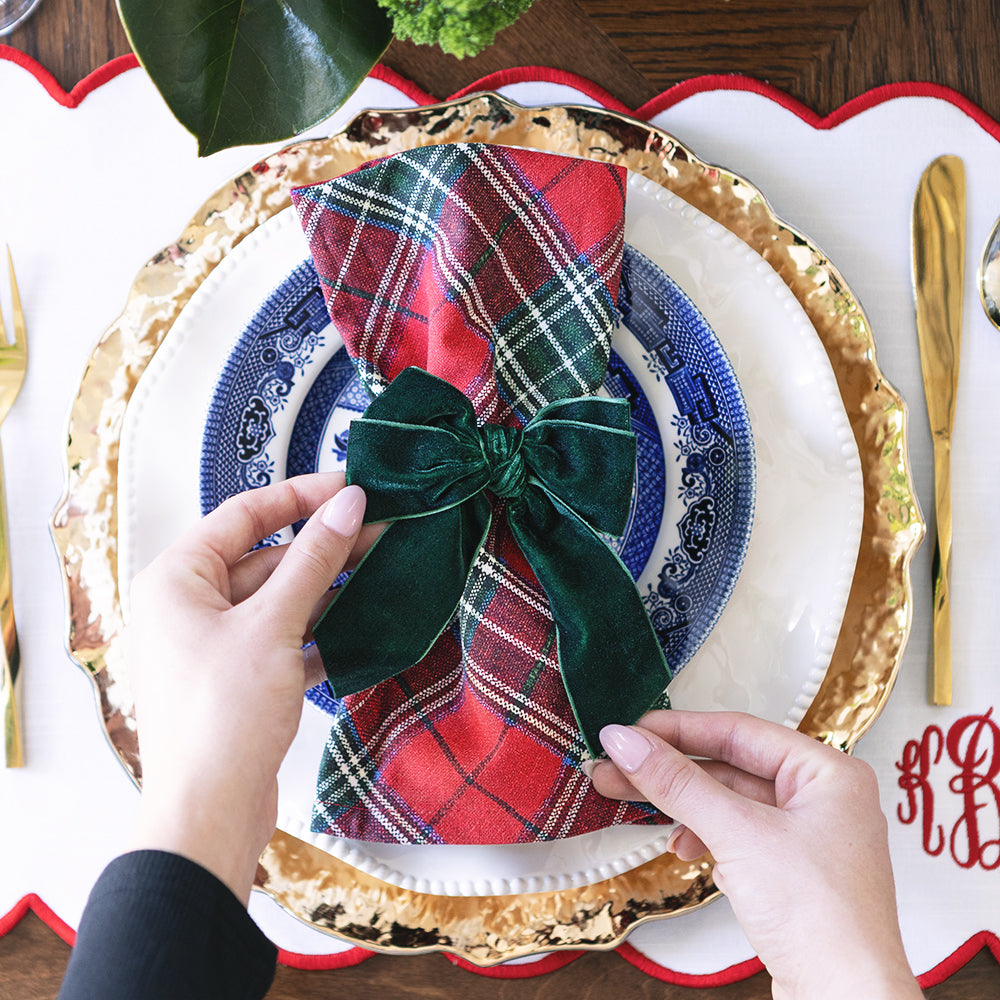 bow napkins holders on plaid christmas napkin 