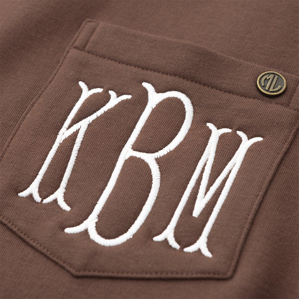 brown crewneck sweatshirt up close