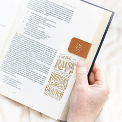 brown magnetic bookmark on page edge
