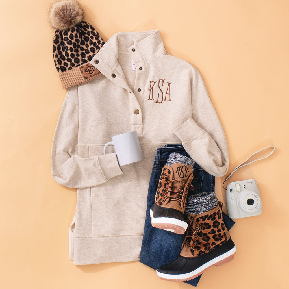 heathered oatmeal pullover with leopard duck boots