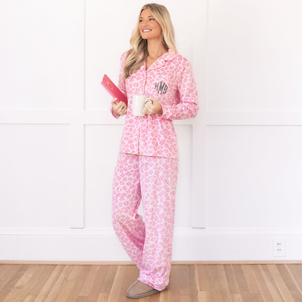 girl wearing pink cheetah monogrammed softspun pajama set