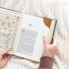 camel corner bookmark while girl reads book