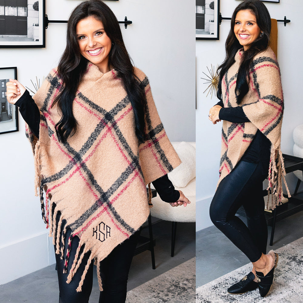 girl wearing monogrammed poncho 